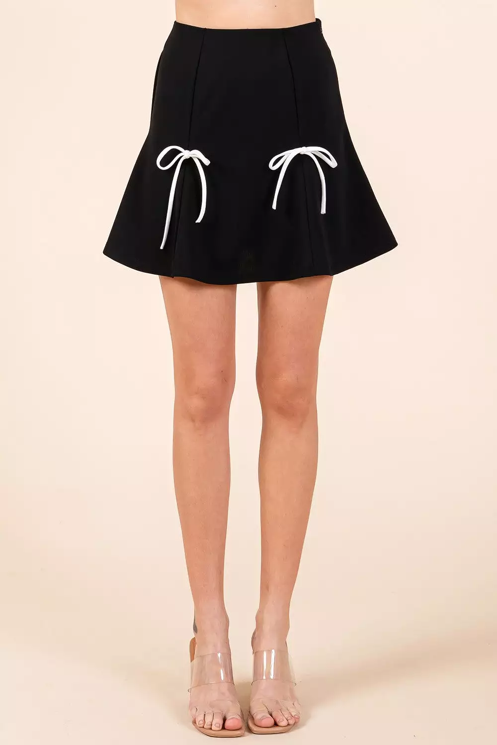 G2-Bow Pleated Mini Skirt - Shop Now.