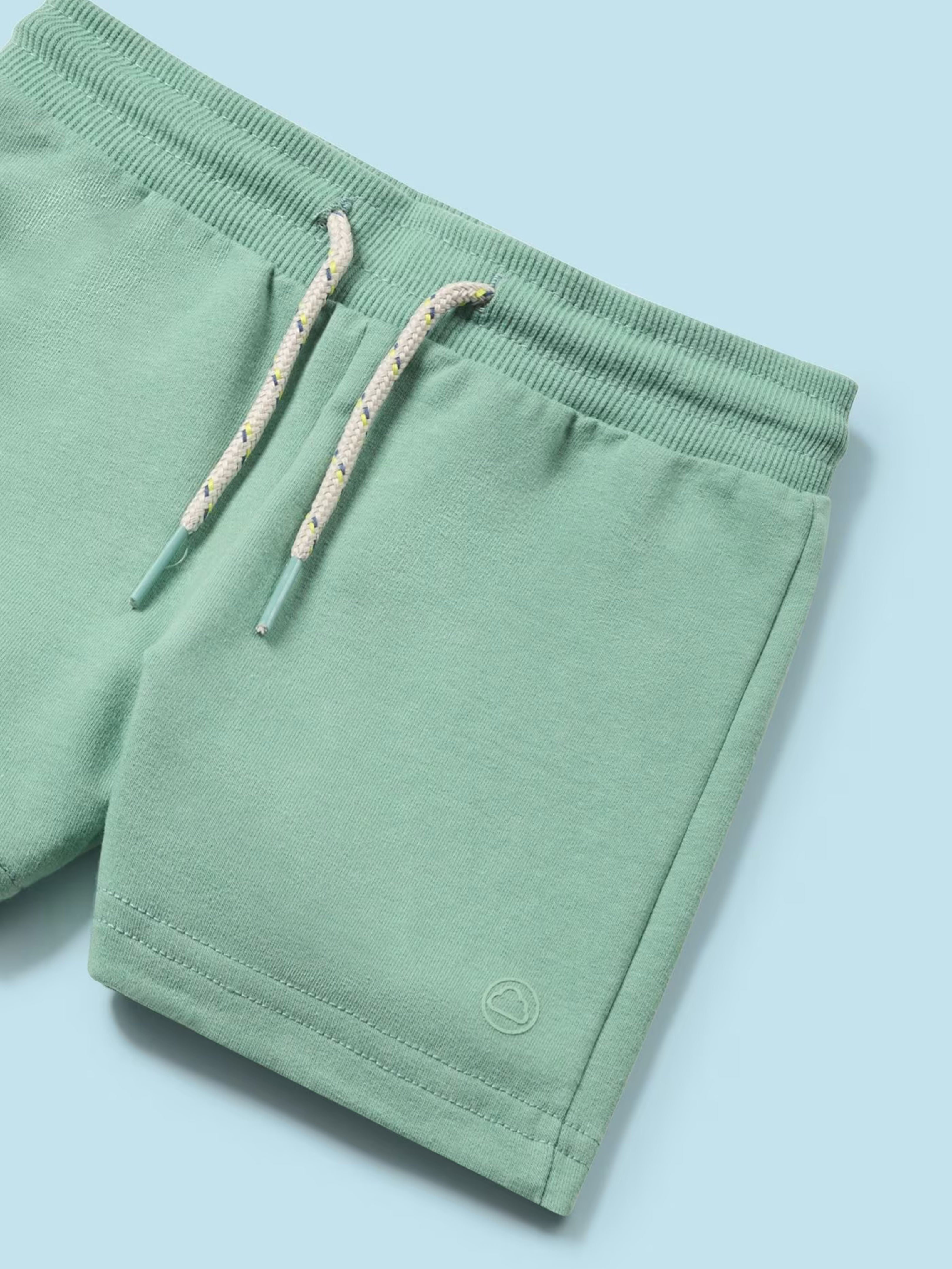 green terry shorts