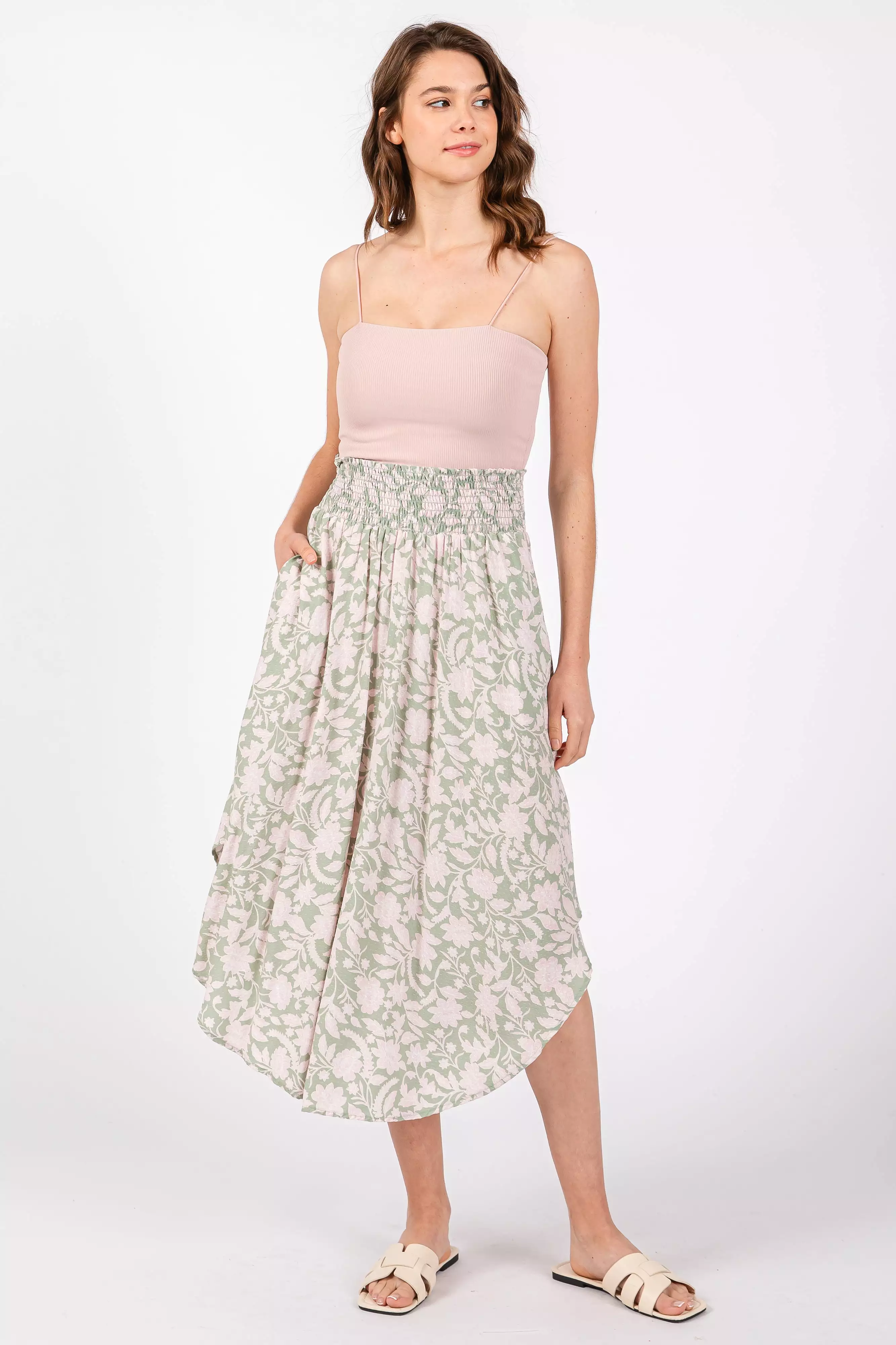 light olive smocked midi skirt with textured dot pattern and round hem