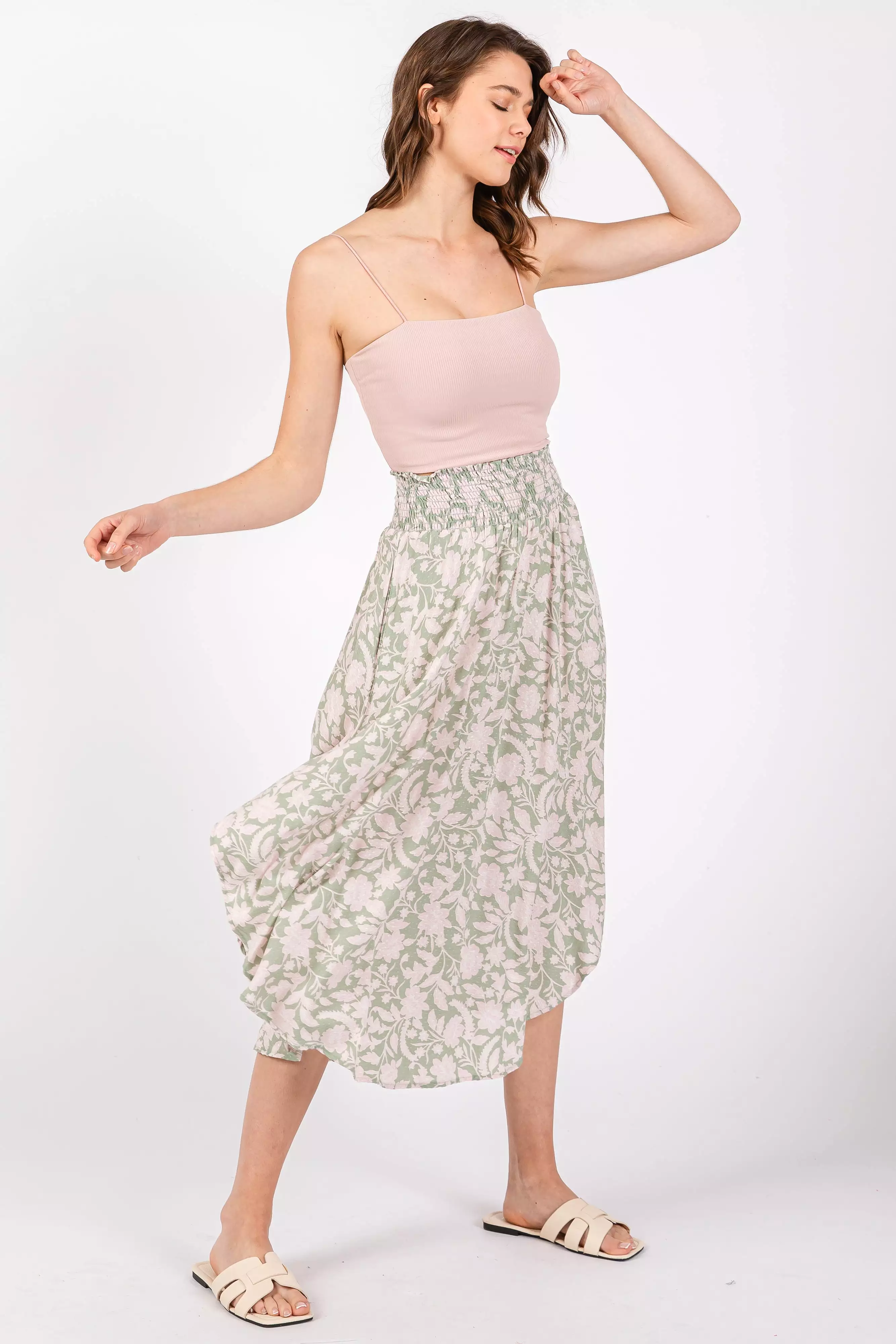 light olive smocked midi skirt with textured dot pattern and round hem